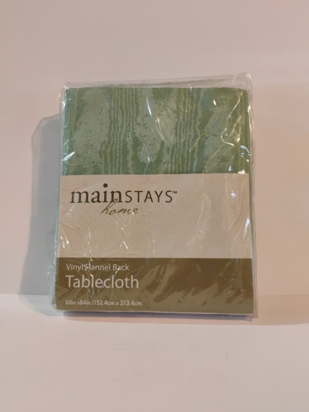 Mainstays Home Vinyl Flannel Back Tablecloth 60 inx84 in  Round Color Sage Moire